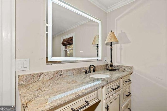 bathroom featuring vanity and crown molding