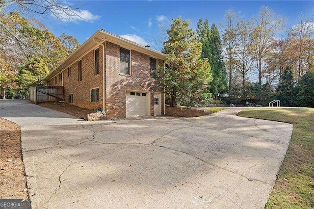 view of home's exterior with a garage