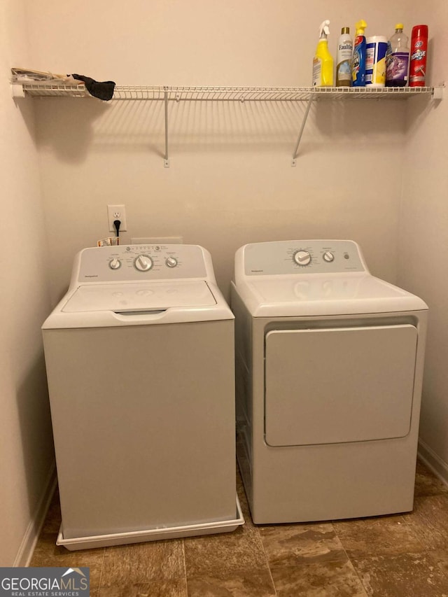 laundry area featuring washer and clothes dryer