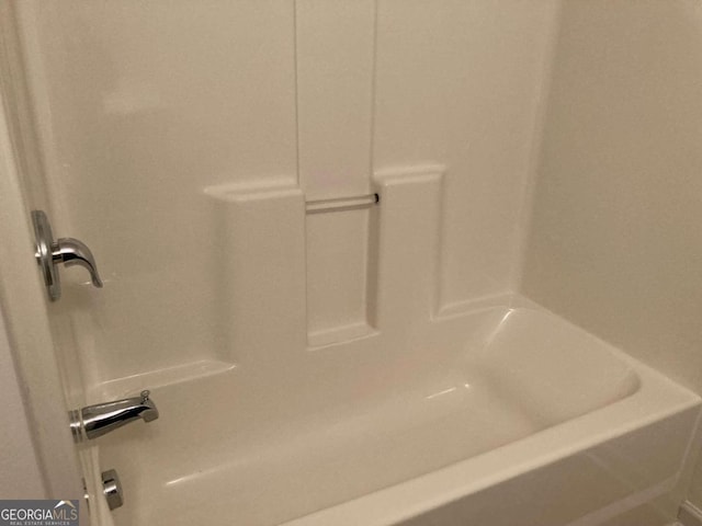 bathroom featuring shower / washtub combination