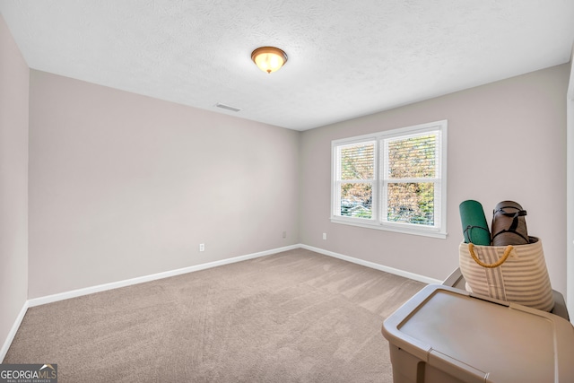 interior space with a textured ceiling