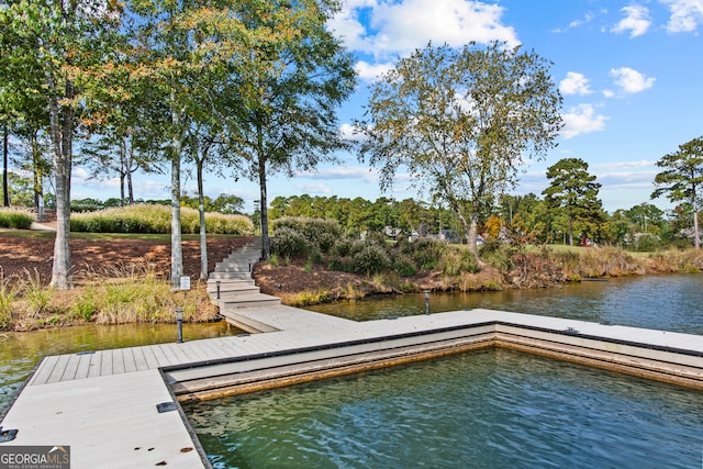 view of dock with a water view