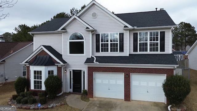 view of front of property featuring a garage