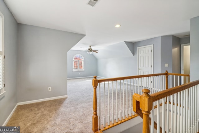 hall with carpet floors