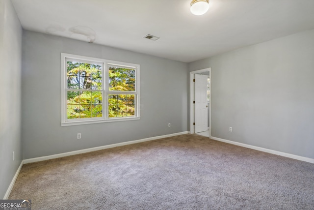 view of carpeted spare room