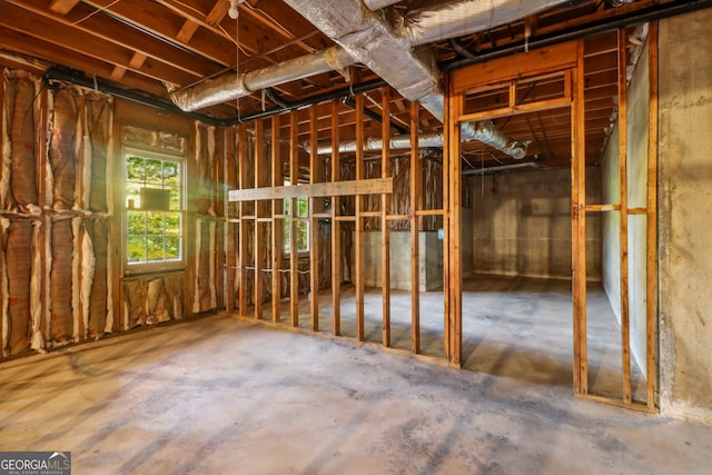 misc room with concrete flooring