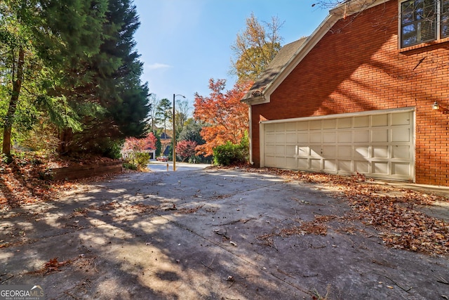 view of home's exterior with a garage