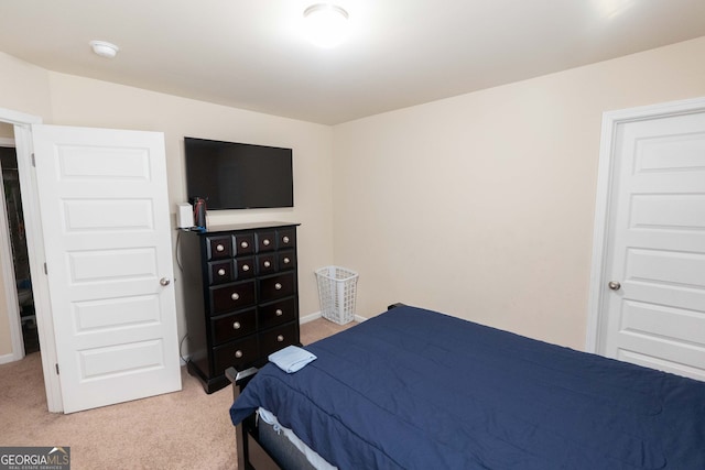 bedroom with light carpet