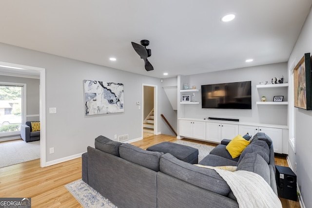 living room with light hardwood / wood-style floors