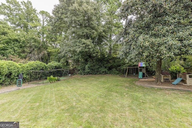 view of yard with a playground