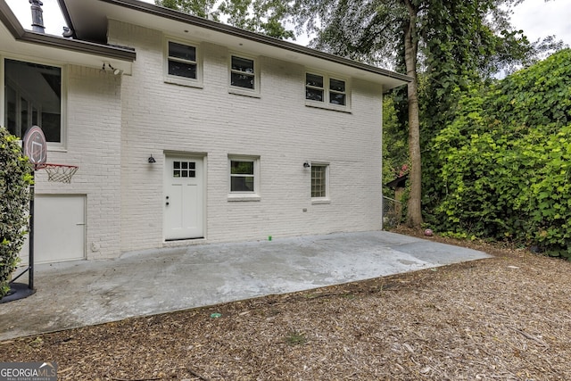 rear view of house with a patio