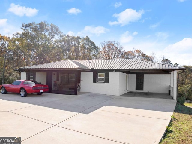 view of front of house featuring a carport