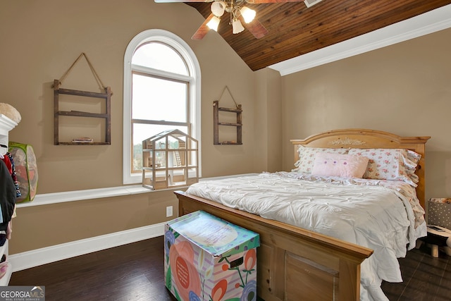 bedroom with dark hardwood / wood-style flooring, vaulted ceiling, ceiling fan, crown molding, and wooden ceiling