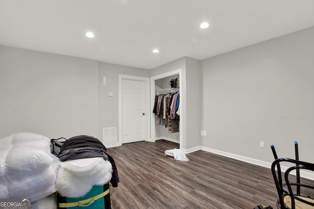 living area featuring dark wood-type flooring