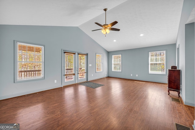 unfurnished living room featuring ceiling fan, hardwood / wood-style floors, and high vaulted ceiling