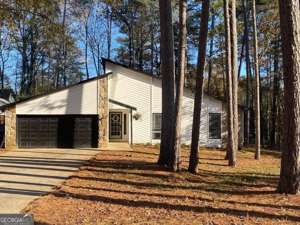 view of front of property with a garage