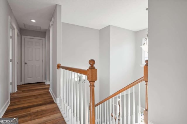 hall with dark hardwood / wood-style flooring