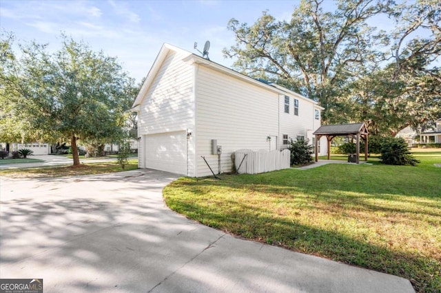 view of side of property with a yard