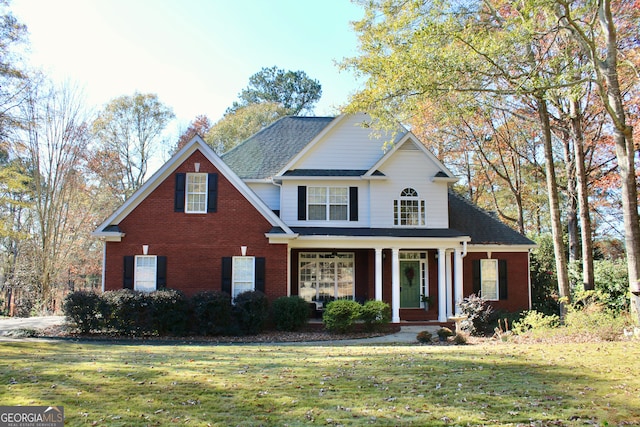 view of front of property with a front lawn