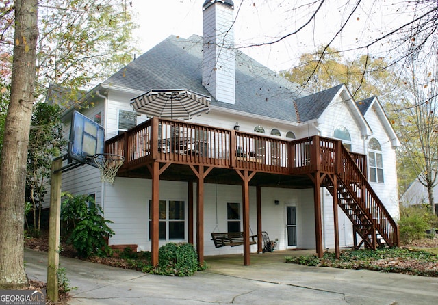 rear view of house with a deck