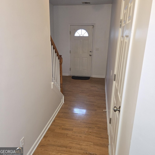 doorway featuring hardwood / wood-style floors