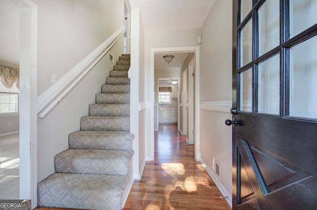 foyer featuring hardwood / wood-style flooring