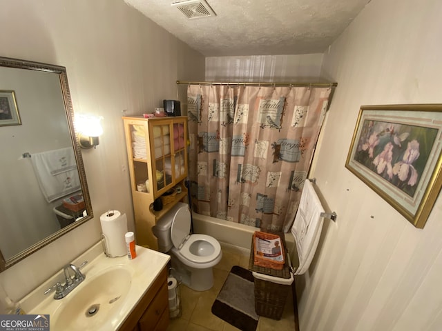 full bathroom with vanity, tile patterned floors, toilet, shower / bathtub combination with curtain, and a textured ceiling