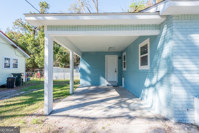 exterior space featuring a carport