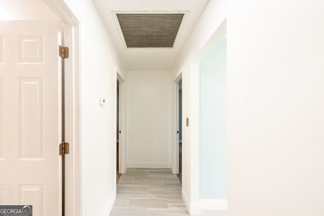 hallway featuring light wood-type flooring