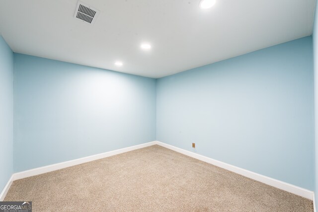 spare room with carpet flooring