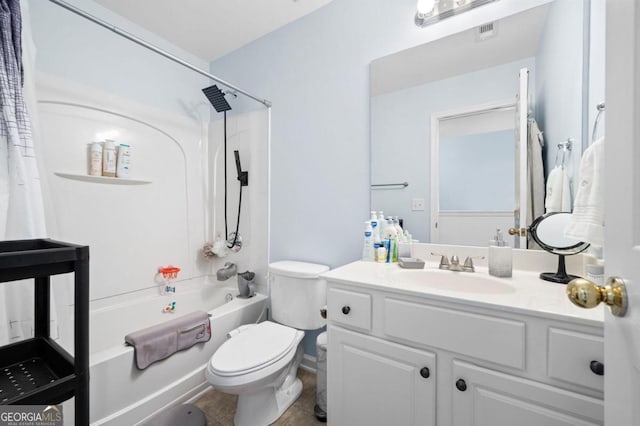 full bathroom featuring tile patterned flooring, vanity, toilet, and shower / bath combo with shower curtain