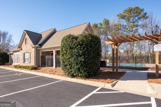 exterior space with a pergola