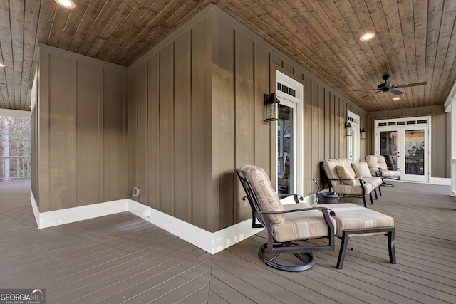 deck featuring ceiling fan and covered porch