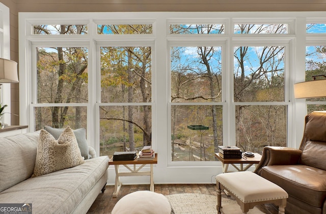 sunroom featuring a wealth of natural light