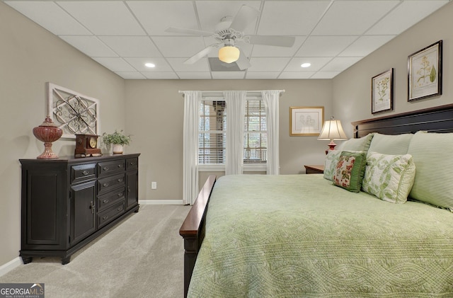 bedroom with light colored carpet and ceiling fan