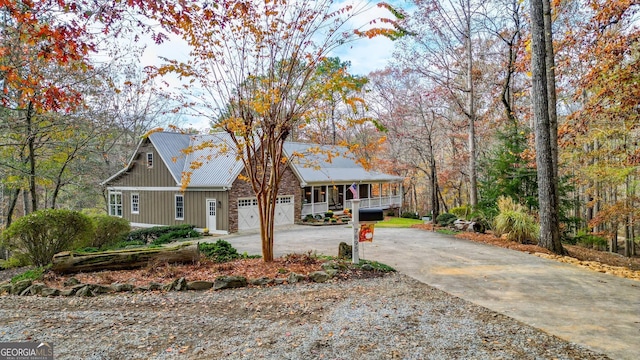 view of front facade with a porch and a garage