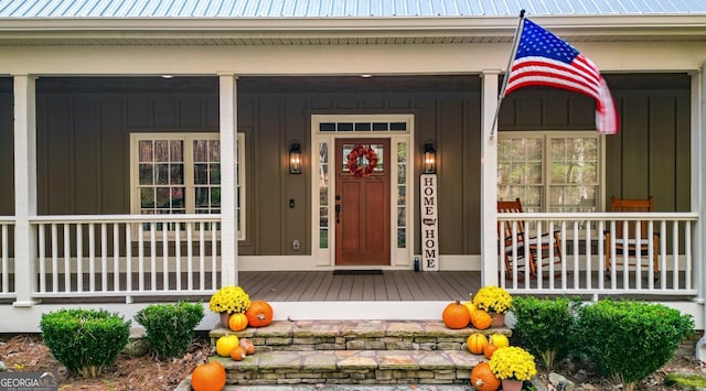 property entrance featuring a porch