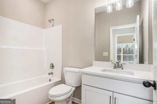 full bathroom with vanity,  shower combination, and toilet