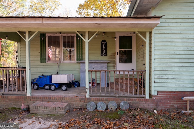 entrance to property with a porch