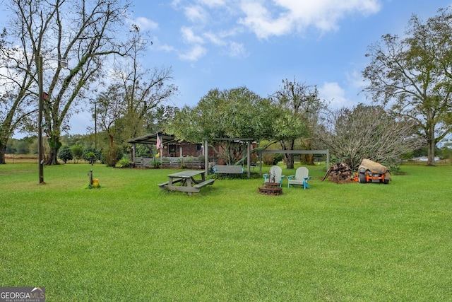 7667 Tallahassee Hwy, Attapulgus, GA 39815 - view of green lawn with a gazebo and an outdoor fire pit