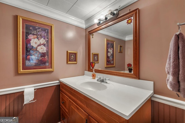 7667 Tallahassee Hwy, Attapulgus, GA 39815 - bathroom with vanity, crown molding, and a wainscoted wall