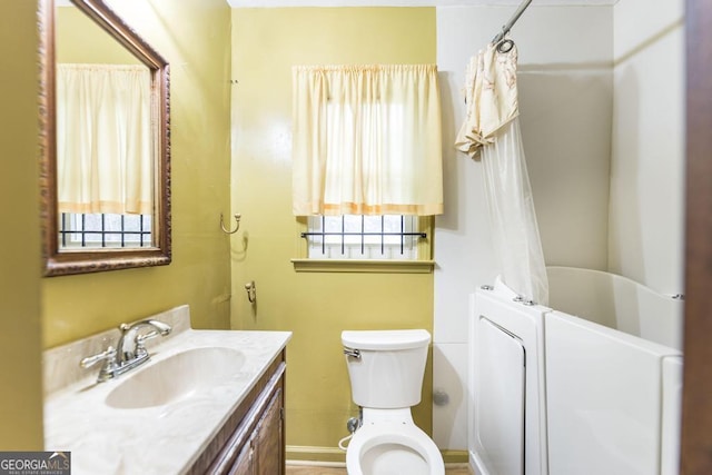 6909 Forsyth Rd, Macon, GA 31210 - full bath with healthy amount of natural light and vanity
