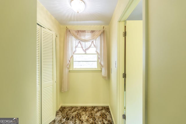 6909 Forsyth Rd, Macon, GA 31210 - hall with carpet floors and baseboards
