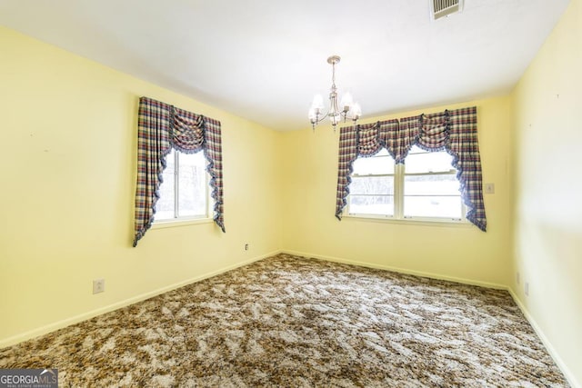 6909 Forsyth Rd, Macon, GA 31210 - carpeted empty room featuring a chandelier and baseboards
