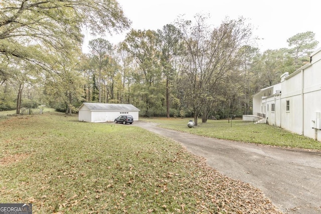 6909 Forsyth Rd, Macon, GA 31210 - view of street featuring view of wooded area