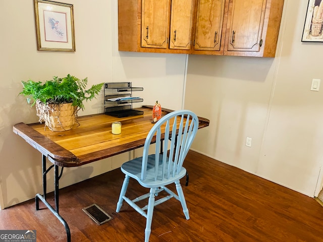 office with hardwood / wood-style flooring