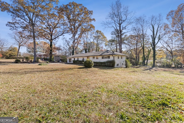 view of front of home with a front yard