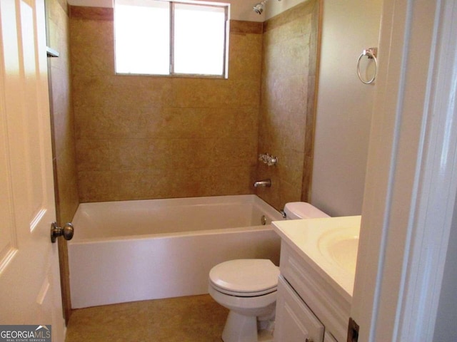 full bathroom with vanity, tiled shower / bath combo, and toilet