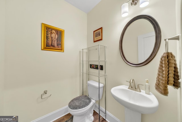 bathroom with sink and toilet