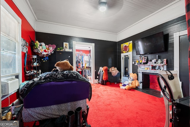 bedroom with carpet, cooling unit, and ornamental molding